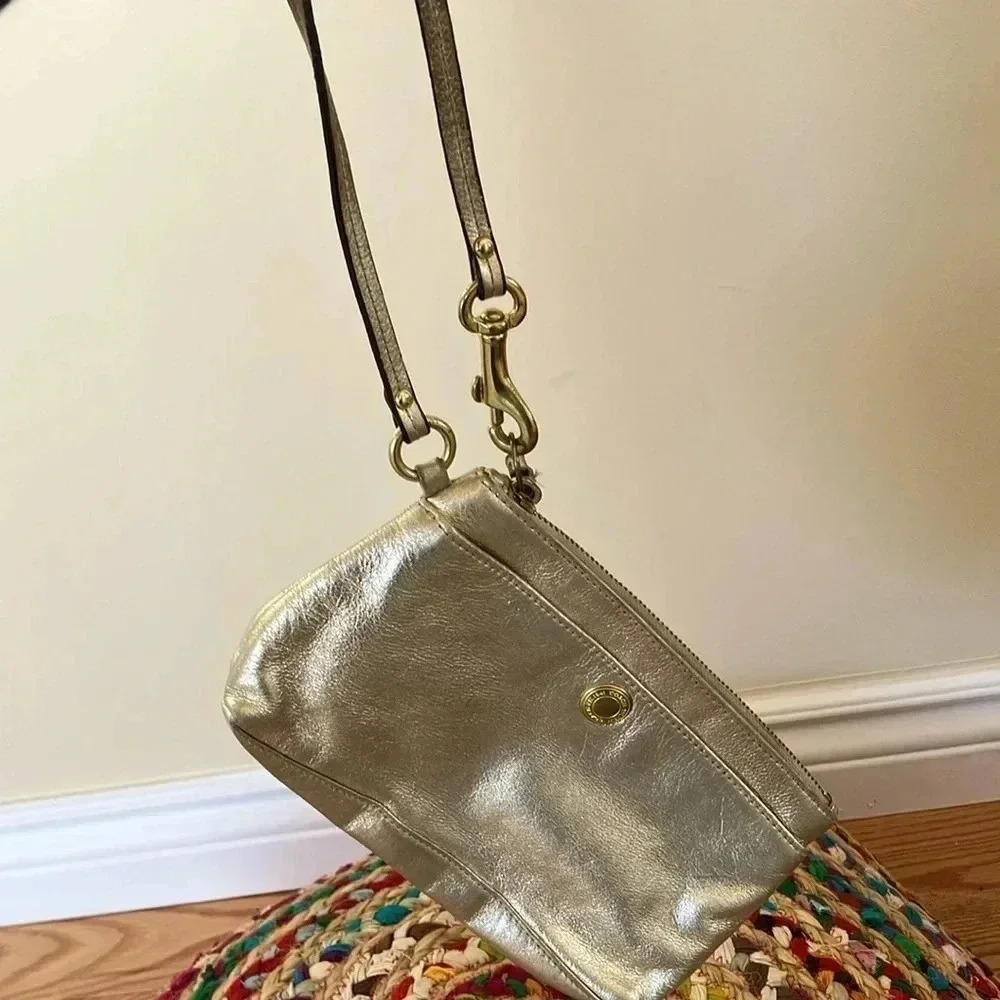 Coach gold metallic leather  pouch clutch wristlet